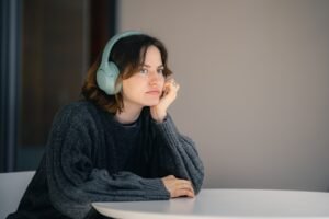 Woman wearing headphones during a quiet sensory break